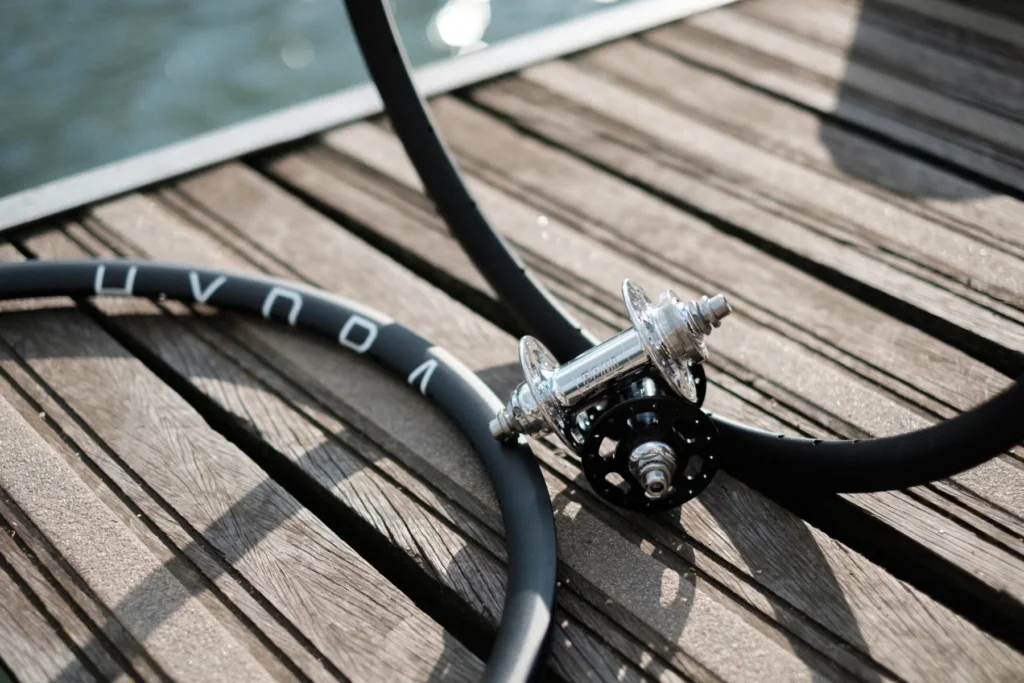 H Plus Son rim and PAUL hub on wooden decking
