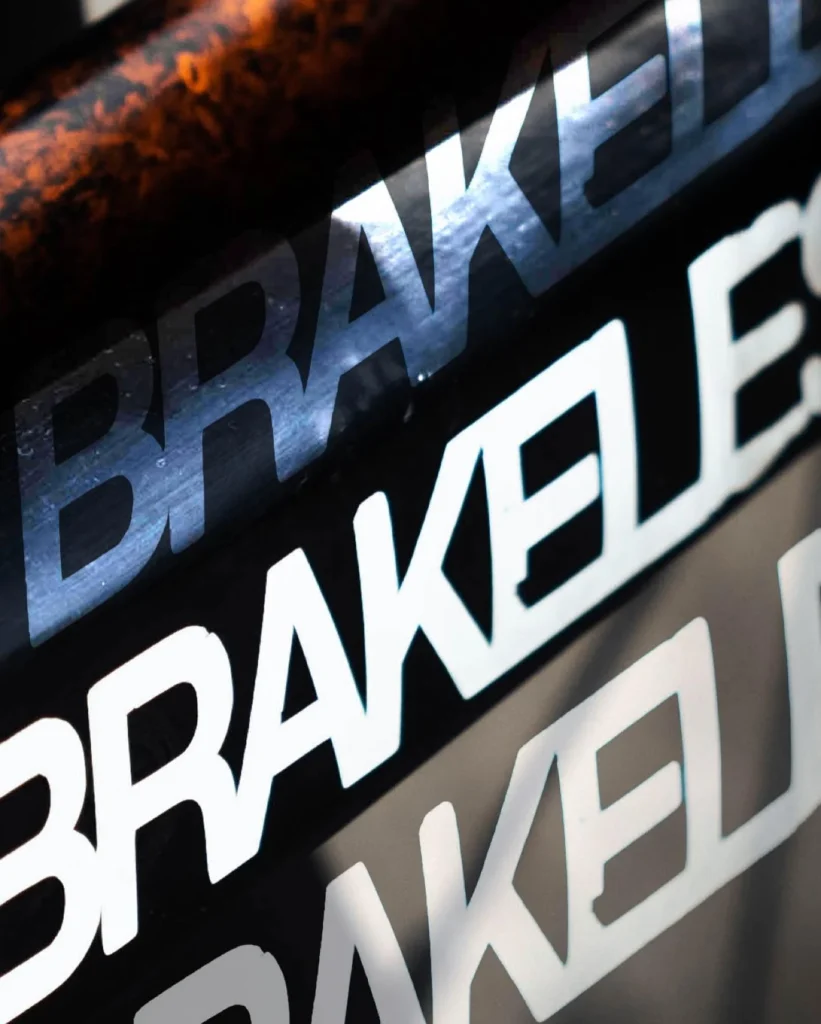 A layered close-up of the Skream and Brakeless frame graphics