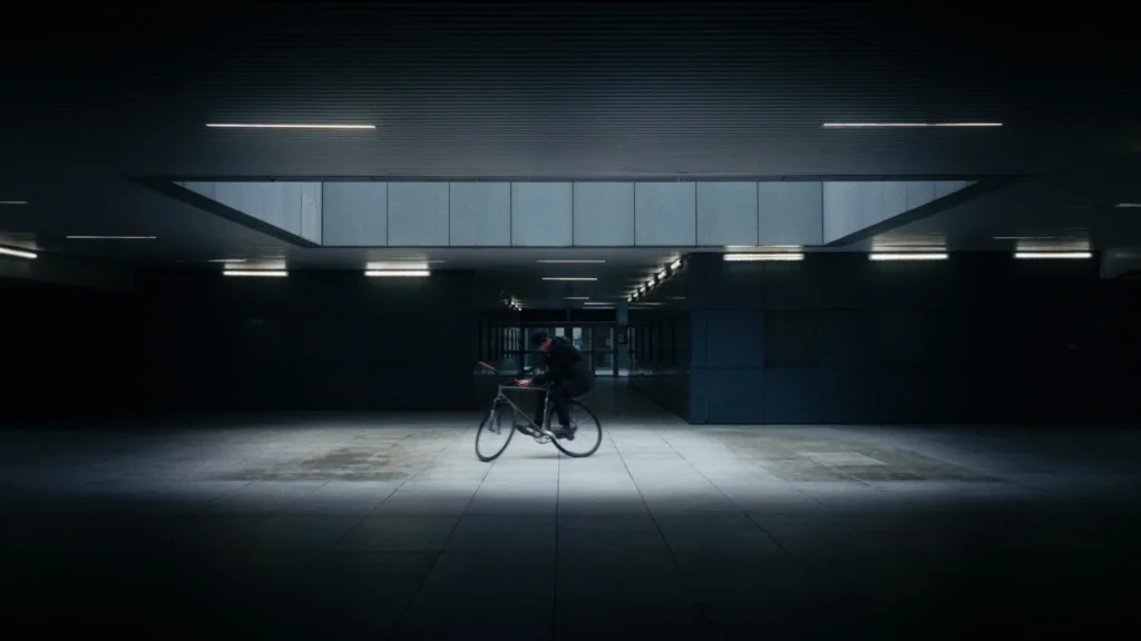 El Fakijoe riding in an illuminated underground car park